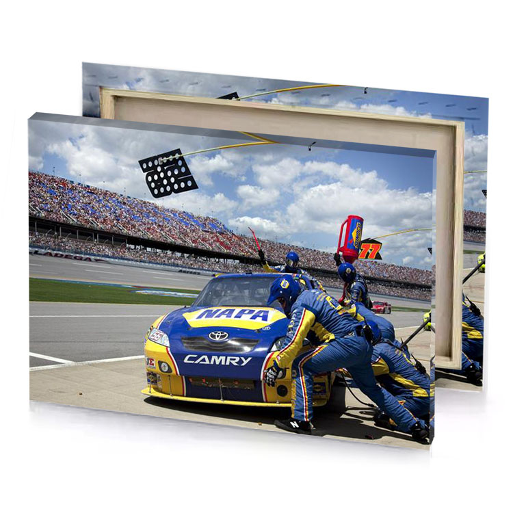 a man in blue and yellow racing suit midnight canvas