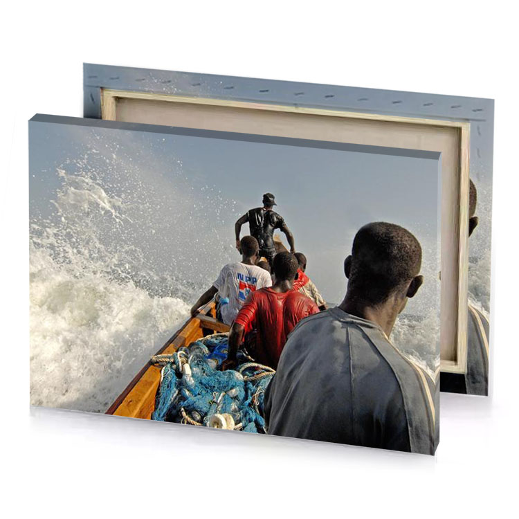 a man in boat with bunch of fish burgundy canvas