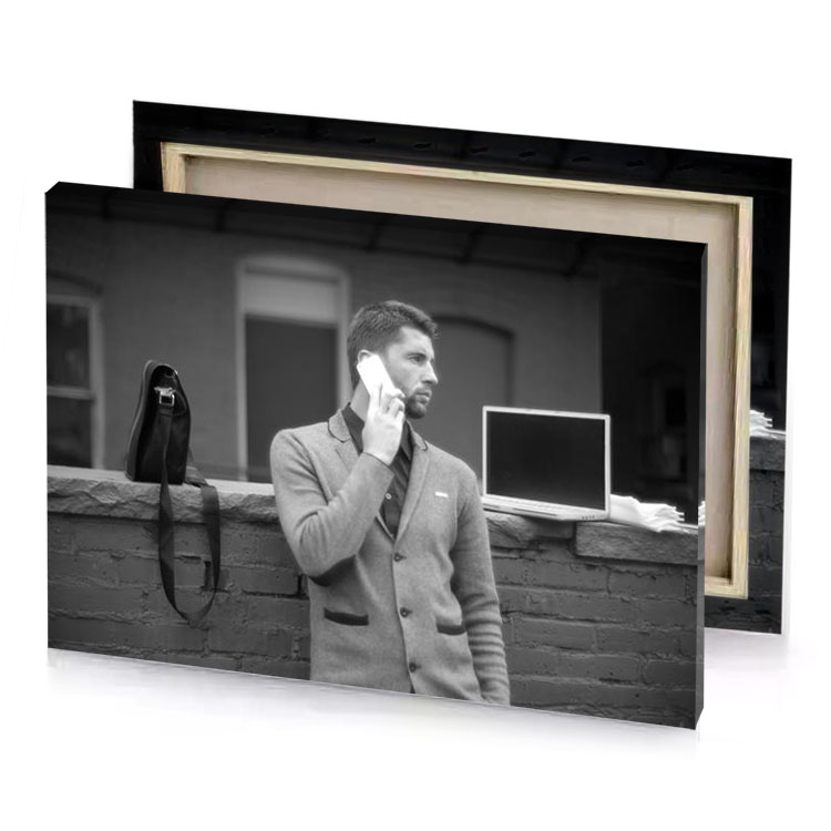 a man in coat talking on cell charcoal canvas