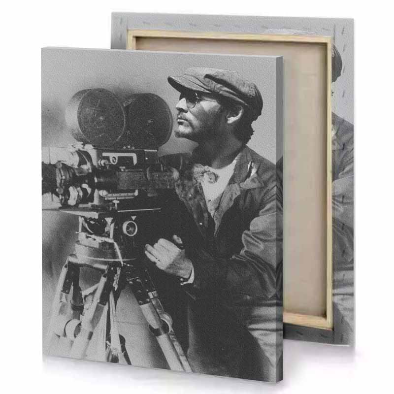 a man in hat and glasses is holding camera zinnwaldite brown canvas