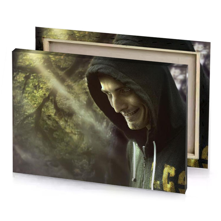 a man in hoodie is smiling camouflage green canvas