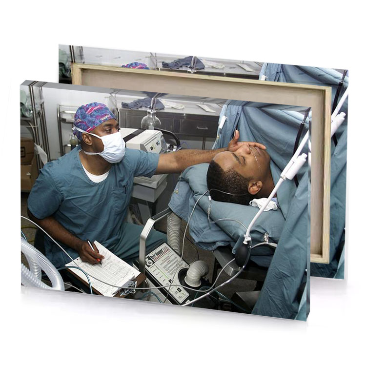 a man in hospital bed with patient taupe canvas