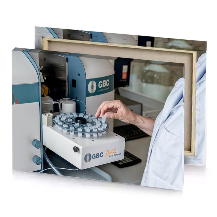 a man in lab coat is using machine tan canvas