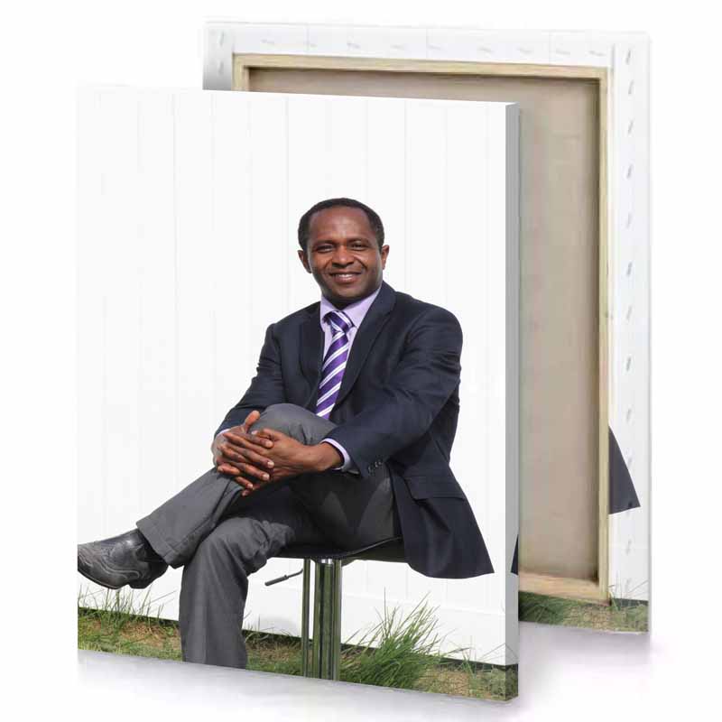a man in suit and tie sitting on chair white smoke canvas
