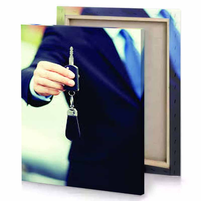 a man in suit holding car key prussian blue canvas