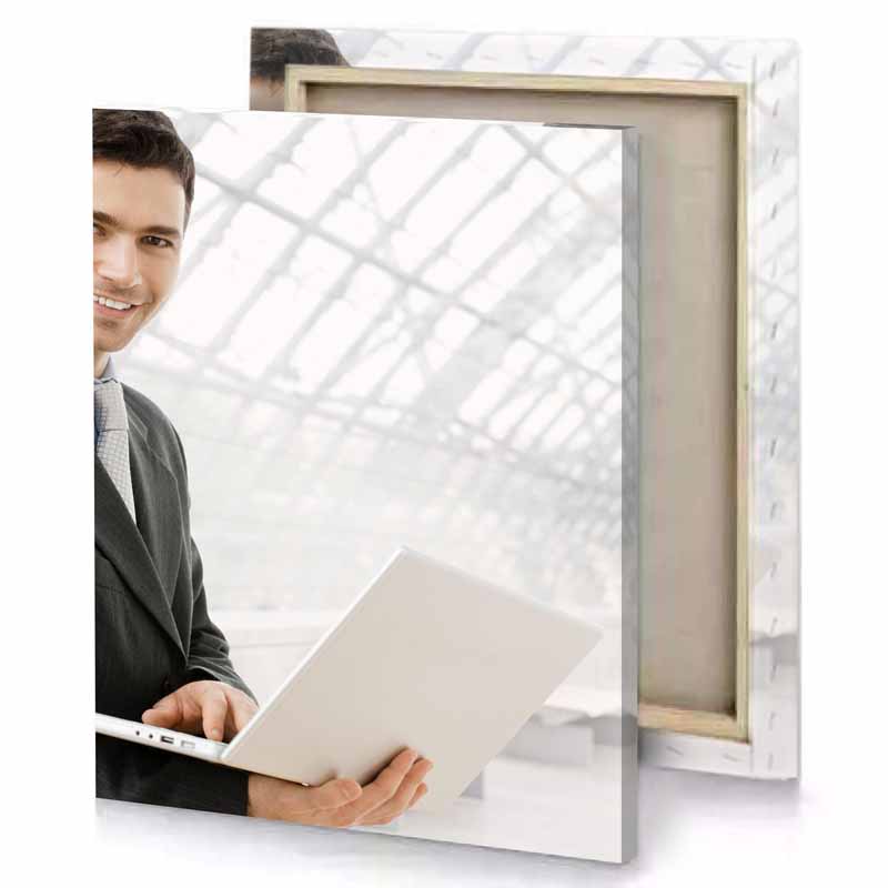 a man in suit holding laptop linen canvas