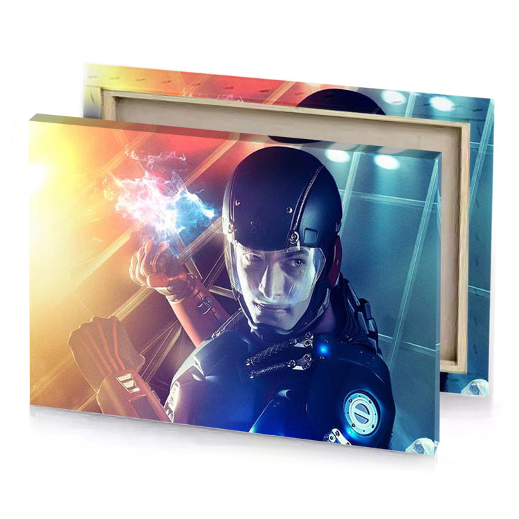 a man in suit holding light prussian blue canvas