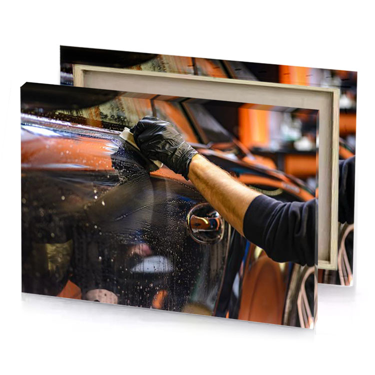 a man is cleaning car with sponge bistre canvas