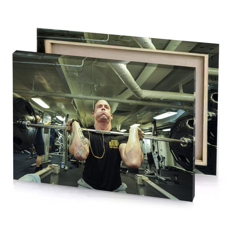 a man is doing squat exercise on bench tan canvas