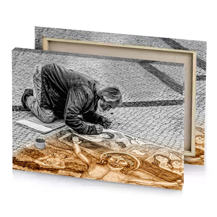 a man is drawing picture on the ground smoky black canvas