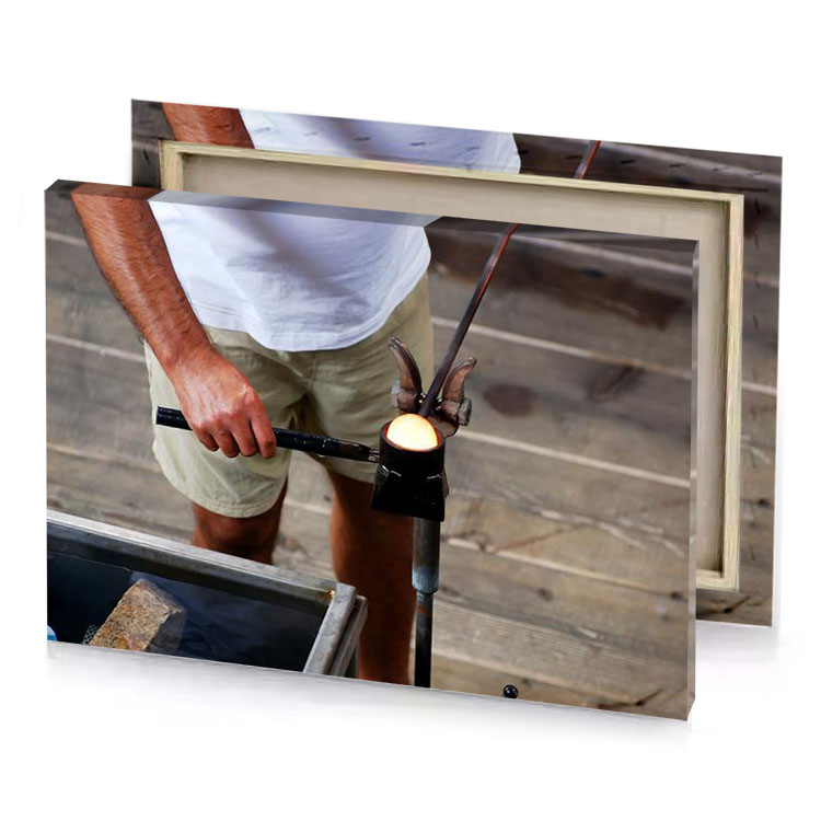 a man is making piece of wood smoky black canvas