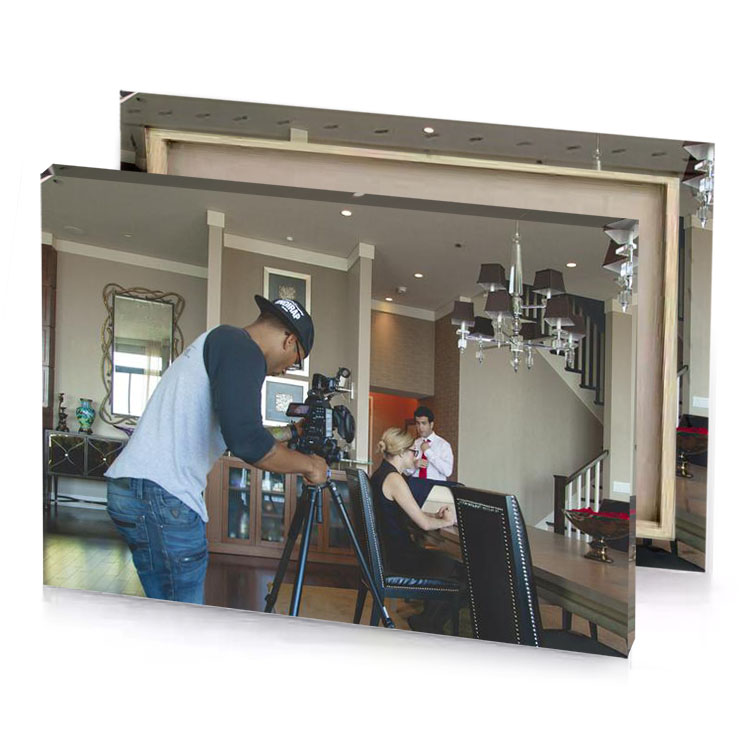 a man is taking picture of woman light steel blue canvas