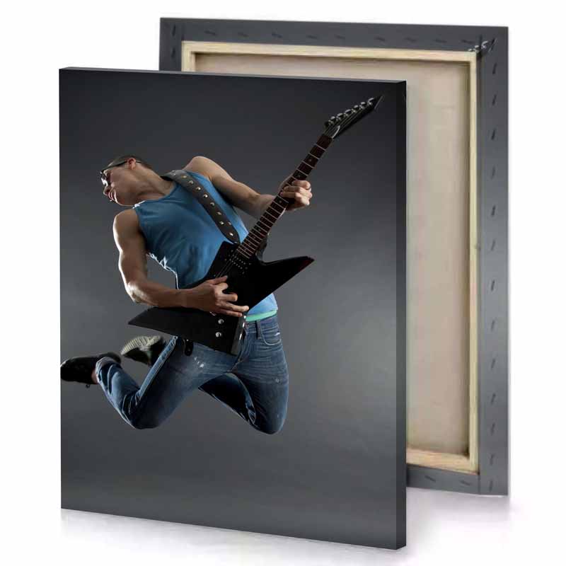 a man jumping in the air with guitar charcoal canvas