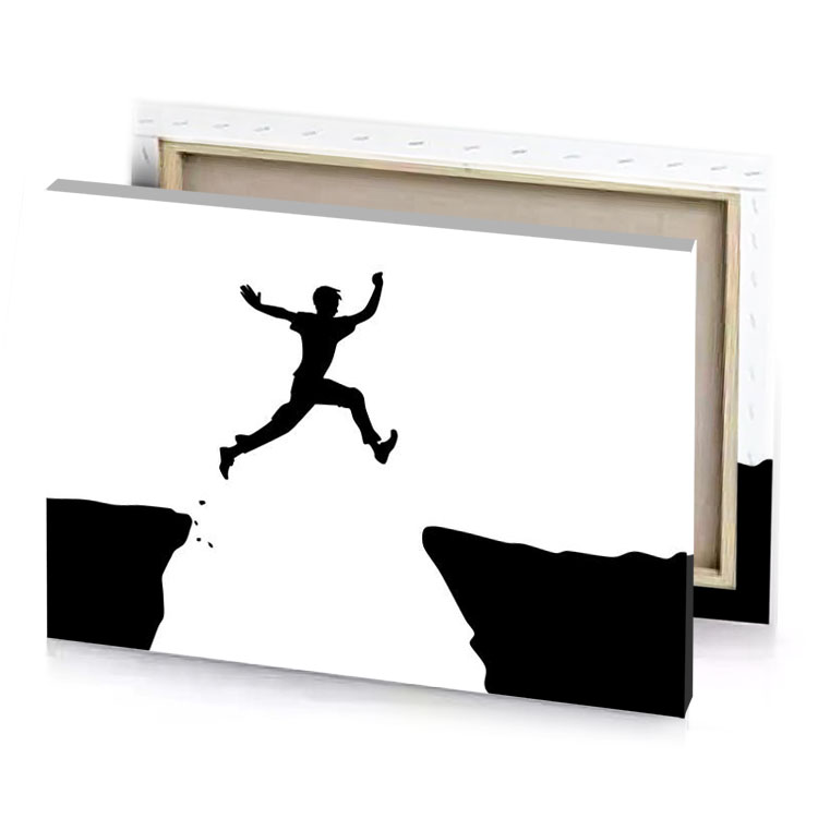 a man jumping off cliff into the ocean white canvas