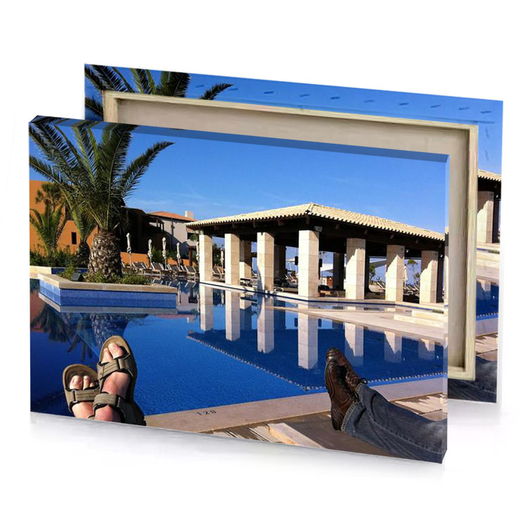 a man laying on lounge chair by swimming pool lapis lazuli canvas