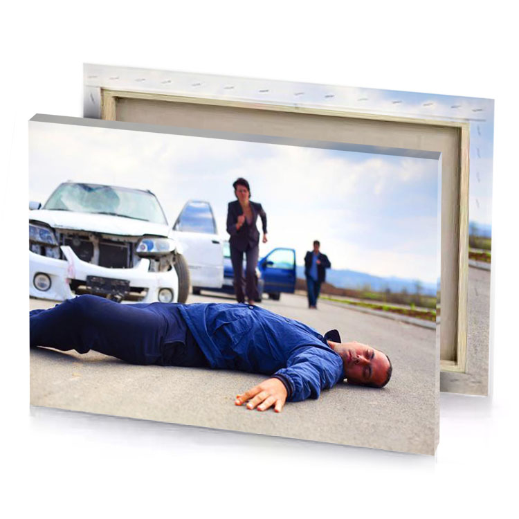 a man laying on the ground next to car sapphire canvas