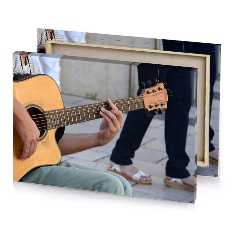 a man playing guitar on the street manatee canvas