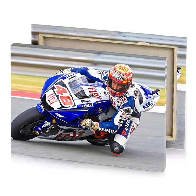 a man riding motorcycle on track midnight blue canvas