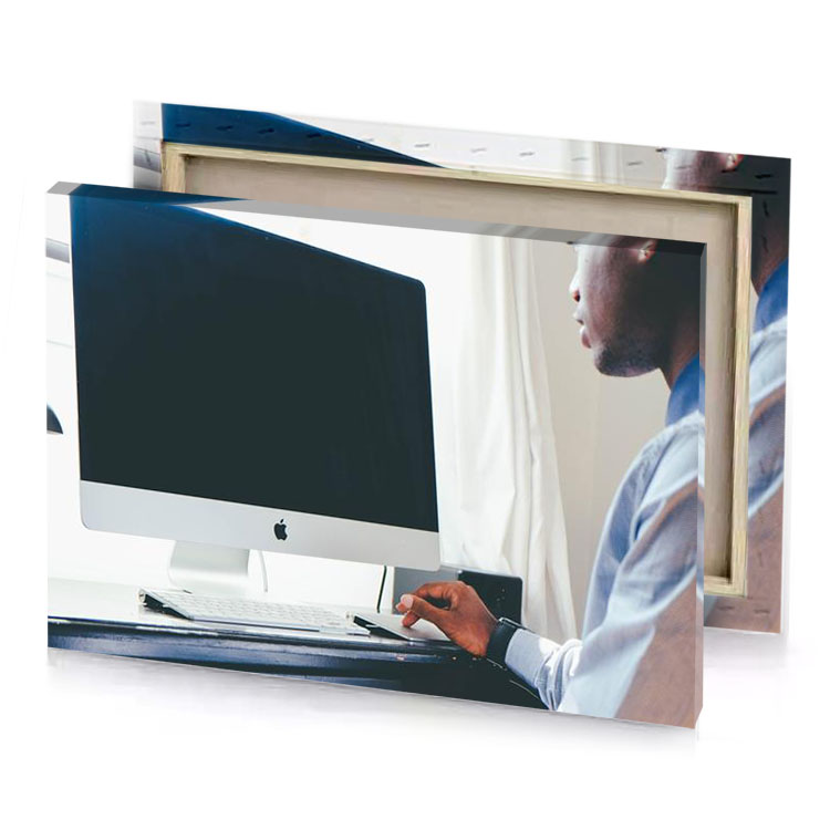a man sitting at desk with computer bistre canvas