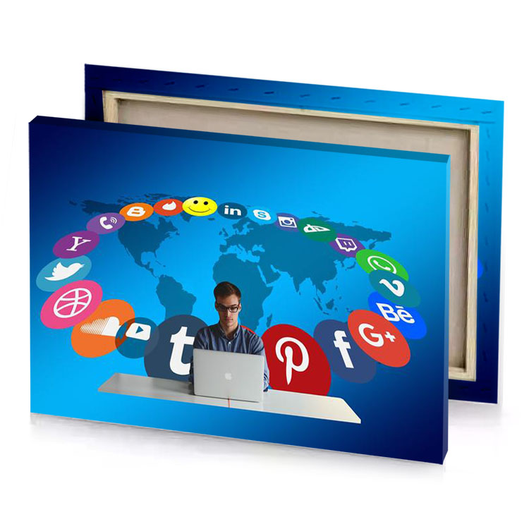 a man sitting at laptop with world map in the dark cyan canvas
