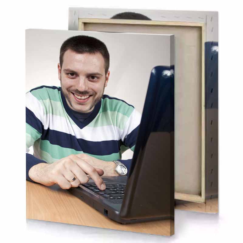 a man sitting at table with laptop bistre canvas