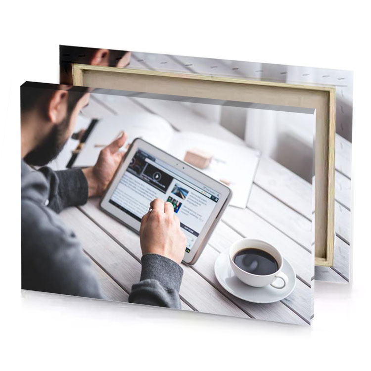 a man sitting at table with tablet white smoke canvas