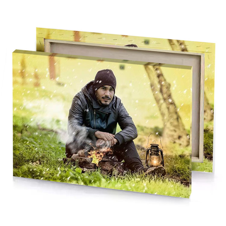 a man sitting in the grass with lantern dark khaki canvas