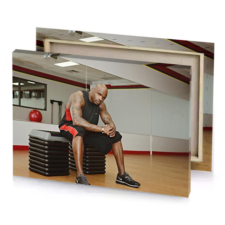 a man sitting on stool dark gray canvas