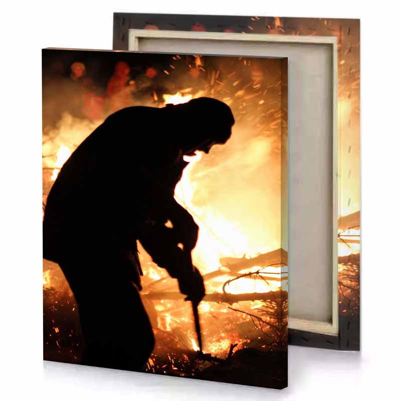 a man standing in front of fire vanilla canvas