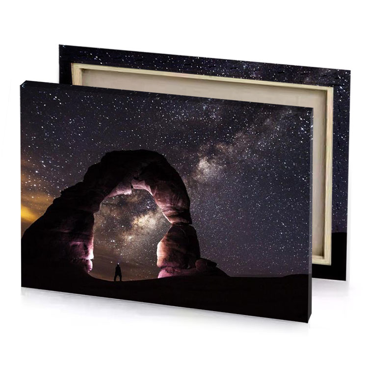 a man standing in the middle of desert under starr taupe canvas