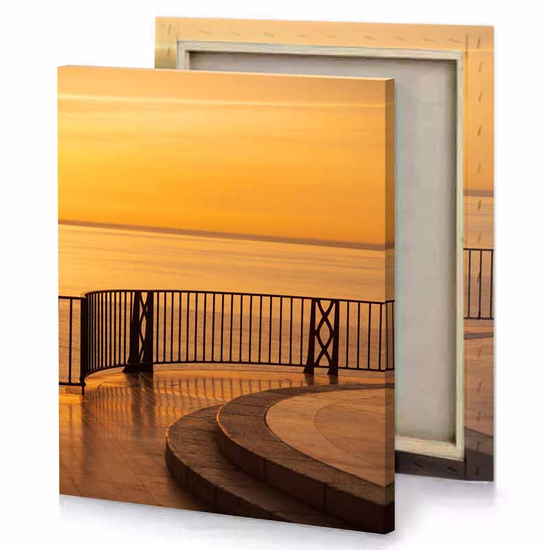 a man standing on pier watching the sunset yellow orange canvas