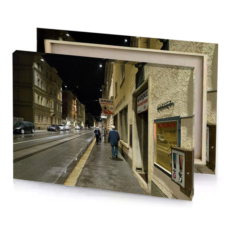 a man walking down street next to building dim gray canvas