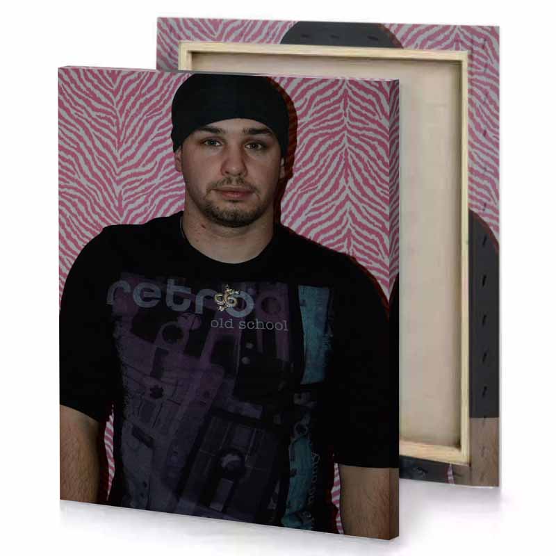 a man wearing black shirt and hat smoky canvas