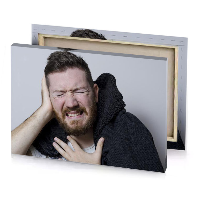 a man with beard and sweater on silver canvas