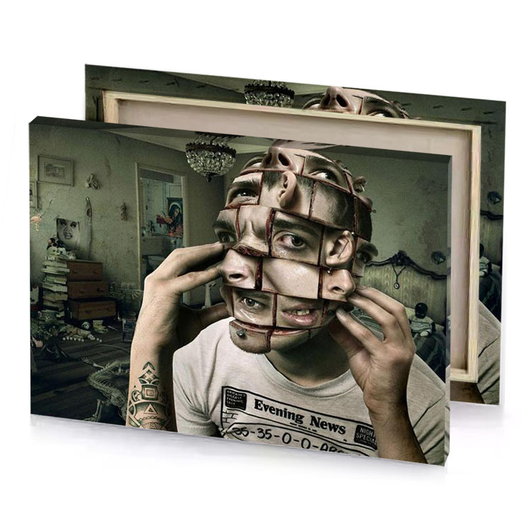 a man with face made out of piece paper silver canvas
