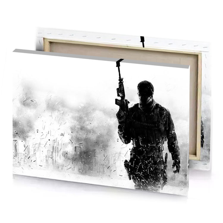 a man with gun walking through field smoky black canvas