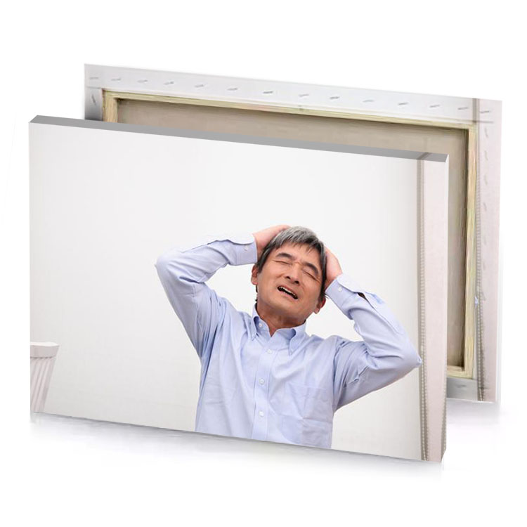 a man with his hands on head platinum canvas