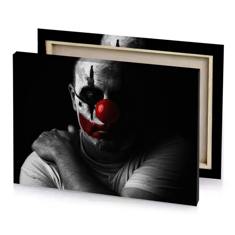 a man with red clown mask on his face burgundy canvas