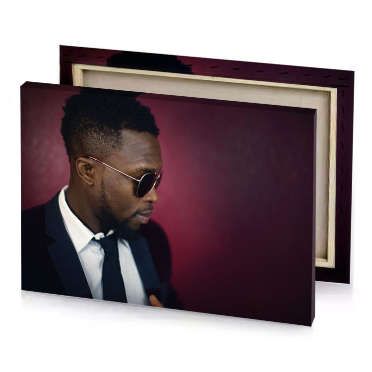 a man with tie and sunglasses on garnet canvas