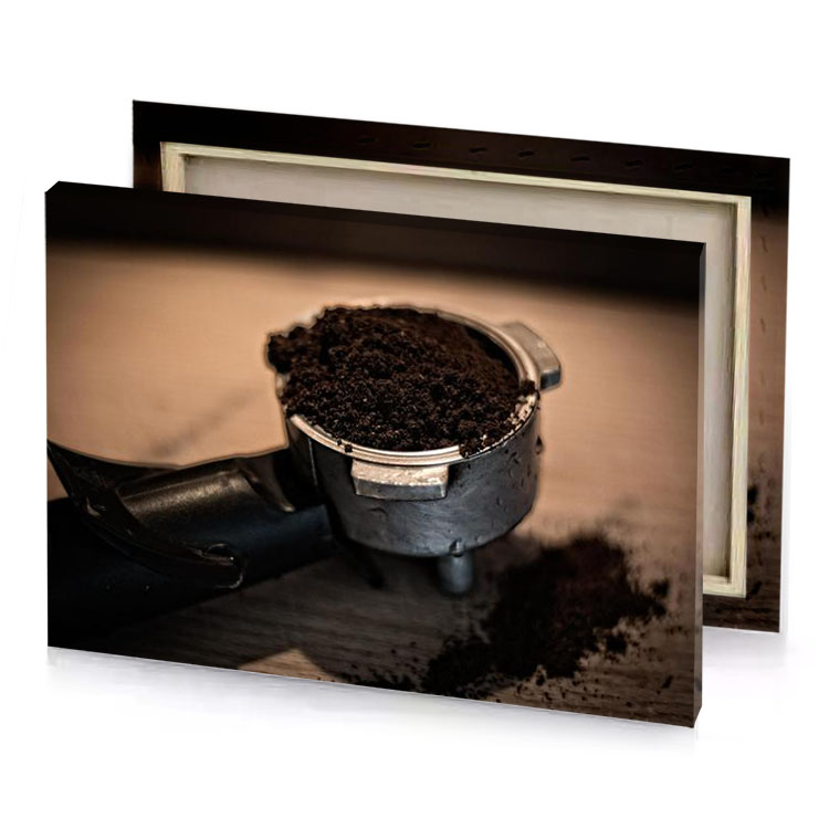a metal cup filled with dirt on wooden table smoky black canvas