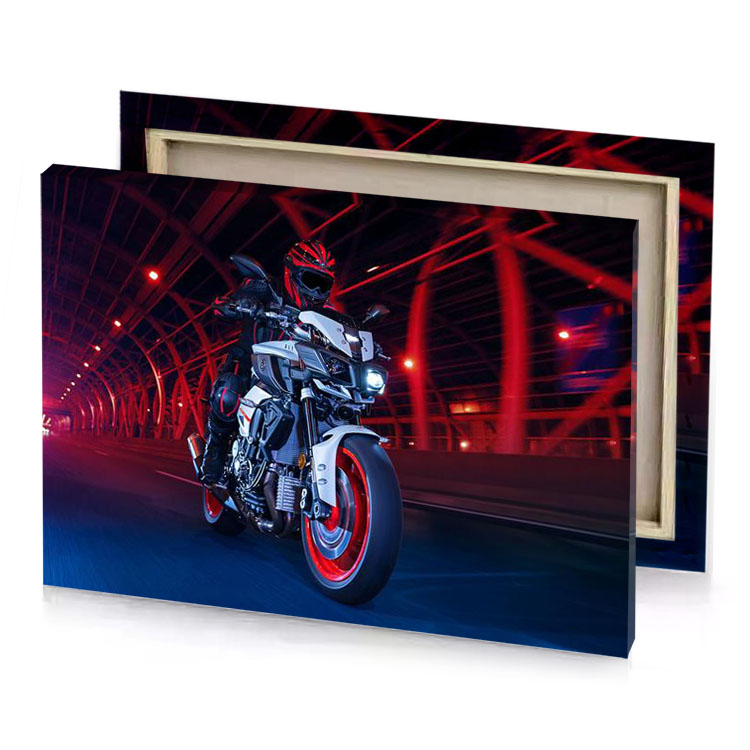 a motorcycle driving on road charcoal canvas
