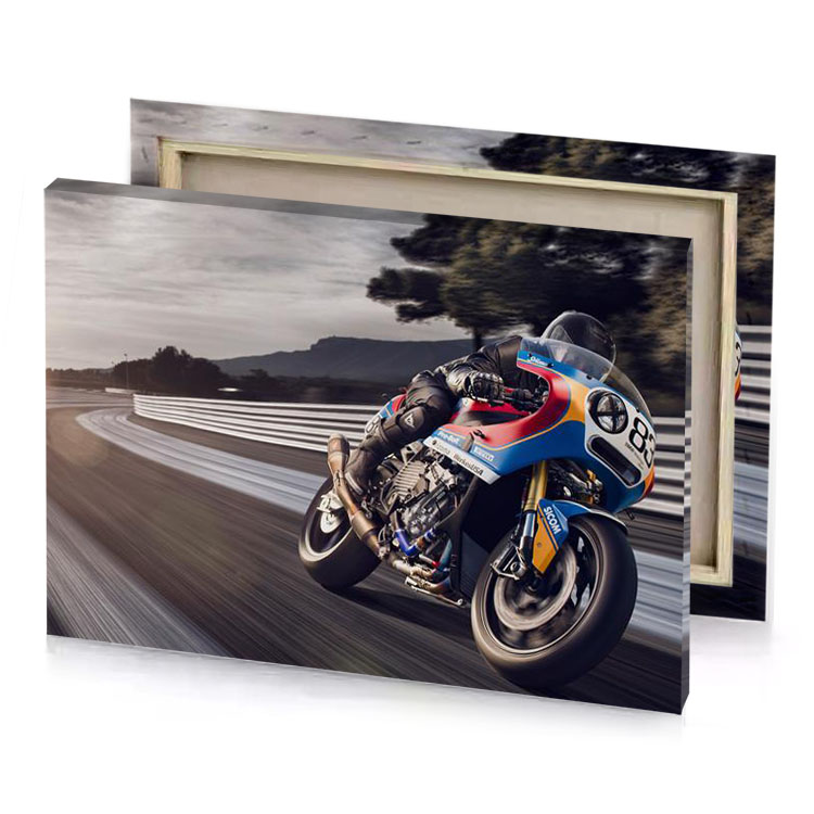 a motorcycle is driving on road with blur dim gray canvas