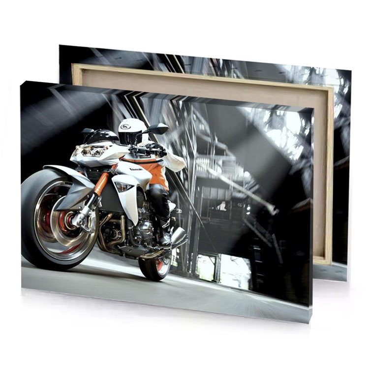 a motorcycle is moving down narrow street charcoal canvas