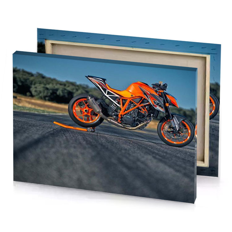 a motorcycle is parked on the road near trees charcoal canvas