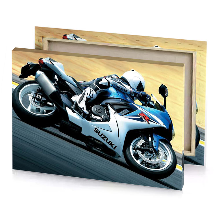 a motorcycle is racing on track smoky black canvas