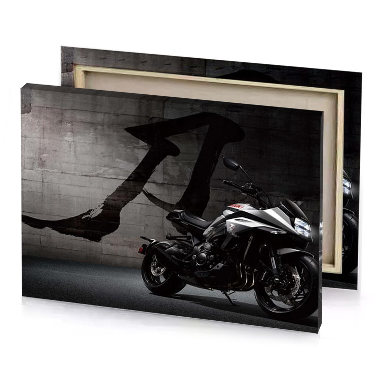 a motorcycle parked in front of wall dim gray canvas