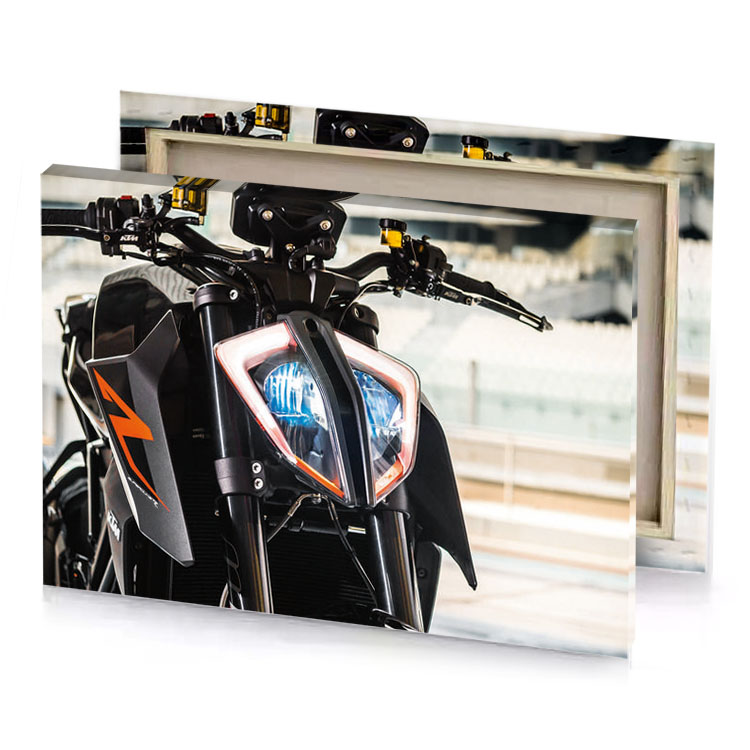 a motorcycle parked in parking area with light on the smoky black canvas