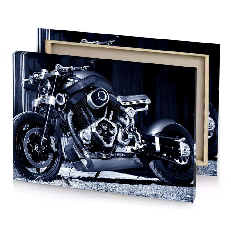 a motorcycle parked in the dark smoky black canvas