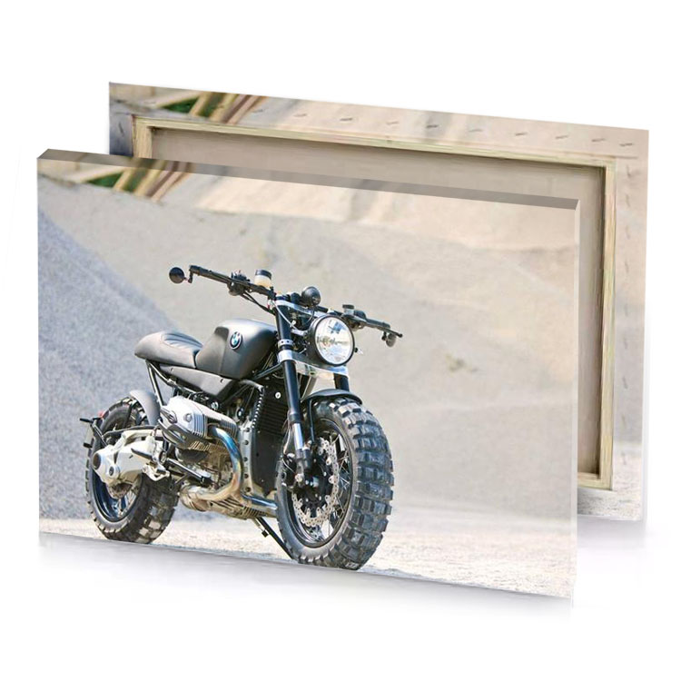 a motorcycle parked on gravel road bistre canvas