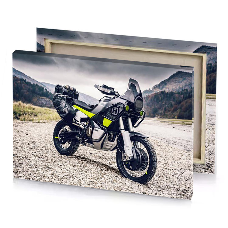 a motorcycle parked on gravel road near mountain platinum canvas